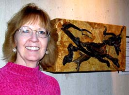 Rene and her piece in The Box Show.   Susan Shie 2005.
