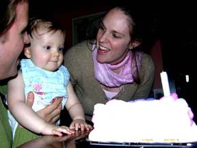 Mike, Gretchen, Eva, and her cake. Susan Shie 2005.