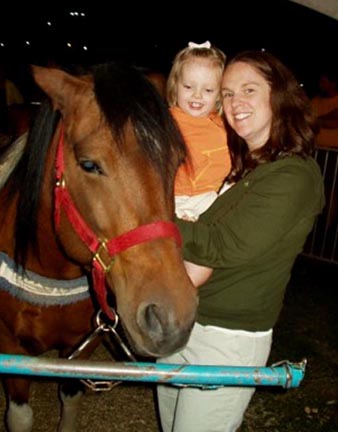 Eva and Gretchen with the pony. Susan Shie 2006.