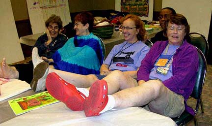 Students at QSDS with their feet up. Susan Shie 2006.