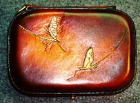 A clamshell style fly case.©James Acord 2000.