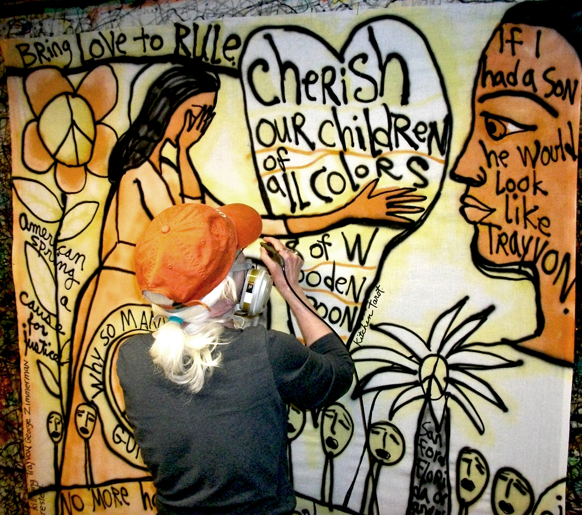 Me airbrushing Trayvon Martin.  ©Susan Shie 2017