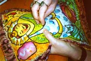 Beading after all the stitching is done. Susan Shie 1999.
