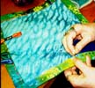 Stitching a border on a beginning of a Lucky Sandwich. Susan Shie 1999.