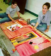 Work on a Pro Art mural of Delaware.