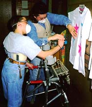 Chris Gonter-Dray and Jimmy do airbrush.