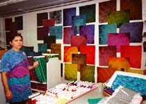 Debra Lunn, co owner of Lunn Fabrics, and some fabric!