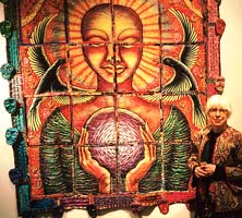 Me with our quilt Prayer for Oklahoma City, at Kent.