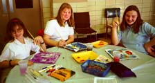 Painting the images onto fabric.