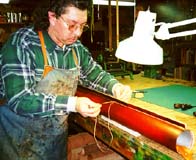 JImmy starts to sew a new rod case.