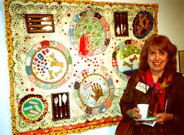 Jane Burch Cochran and her quilt at QN '01. Susan Shie 2001.