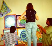 Putting together the conceptual group quilt.Susan Shie 2001.