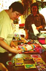 Frances works at placing the pears.Susan Shie 2001.