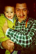 Jimmy holding Omari.