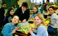 Mary and Core Group students working hard to finish one of hte murals. Susan Shie 2001.
