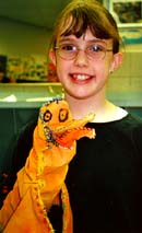 Chelsea Runkle and her bird puppet. Susan Shie 2001.
