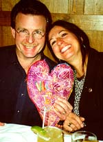Vikki and Joe and their wedding heart.