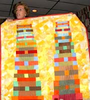 Joyce Seagram and her quilt about 9-11. Susan Shie 2002.