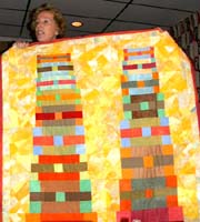 Joyce Seagram and her quilt about 9-11. Susan Shie 2002.