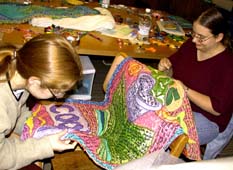 Amanda and Roxanne sewing. Susan Shie 2002.
