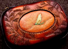 Leather case with pine nnedles.©James Acord 2003.