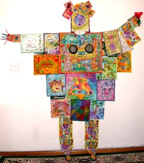 August camp fake quilt as a doll.Susan Shie 2004.