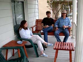Gretchen, Mike, and Jimmy on the porch in Lakewood.Susan Shie 2004.