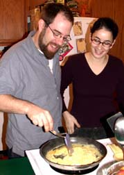 Greg and Jen making eggs.Susan Shie 2004.