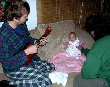 Mike, Jimmy, and Eva - Ukulele seranade.Susan Shie 2004.